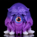 Purple Octopus Fantasy Masturbator Alien Pocket Pussy with a single large blue eye and tentacle-like limbs on a black background.