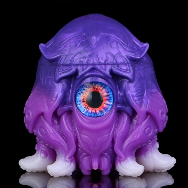Purple Octopus Fantasy Masturbator Alien Pocket Pussy with a single large blue eye and tentacle-like limbs on a black background.