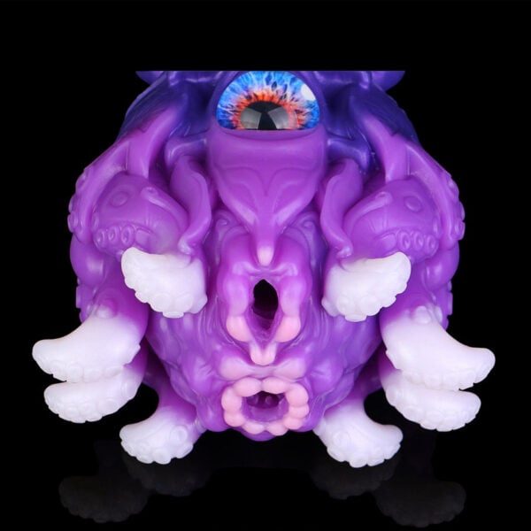 Purple octopus-like Fantasy Masturbator Alien Pocket Pussy toy sculpture with multiple white tentacle feet and a single blue eye on top against a black background.