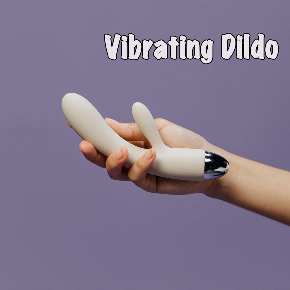 Holding a vibrating dildo in one hand2